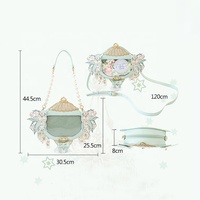 Sac Ita complexe et irrégulier personnalisé sac à bandoulière lampe magique impression UV ailes détachables bandoulière en chaîne de perles