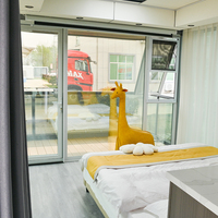 Maison capsule en acier préfabriquée économique à double étage moderne pour usage en villa et hôtel
