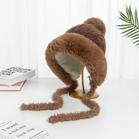 Vente en gros de fil de coton épais et chaud pour protéger les oreilles mentonnières doublées coupe-vent en fourrure de laine pour l'extérieur bonnets d'hiver à pompon pour femmes