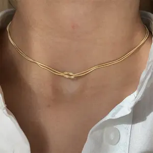 Edelstahl Valentinstag Knoten Schlangenkette Halskette handgefertigter Knoten Klavicle-Kette Herringbone-Armband plattiert mit echtem Goldkragen