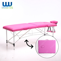 Chaise de massage professionnelle Union Win avec cadre noir, dossier réglable, surmatelas intégré et extension de table pour salon de beauté