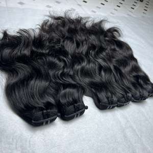 12A Cheveux vierges bruts à cuticule alignée Cheveux vierges ondulés naturels vietnamiens à double tirage, non traités, extensions de cheveux humains - Product Image 1