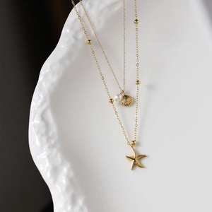 Collier anti-ternissement en or 18 carats en acier inoxydable véritable, bijoux fins, colliers superposés à la mode avec étoile de mer et coquillage pour femme - Product Image 6