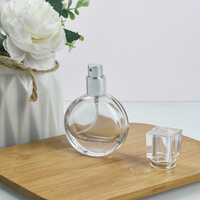 Flacon de parfum en verre transparent rond rechargeable de 25 ml avec pompe pulvérisatrice, sérigraphie, diffuseur de roseaux portable pour voyage