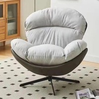 Fauteuil à bascule pivotant moderne et minimaliste en métal avec accoudoirs, chaise de loisirs de luxe léger pour salon, chambre et balcon