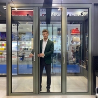 Porte pliante en aluminium soudée sans joint avec quincaillerie allemande, porte pliante en aluminium
