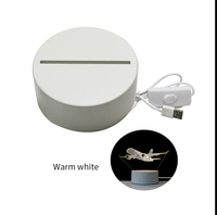 Lampe de chevet LED moderne noire et blanche, base en acrylique, alimentée par piles, lumière circulaire 3D pour chambre à coucher