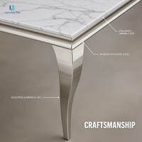 Table à manger en marbre blanc Calacatta naturel Luca |   Pieds en acier argenté poli, plateau rectangulaire, luxe, villa, hôtel, taille personnalisée, USA