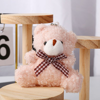 Vente en gros de mini pendentifs mignons en forme d'ours avec nœud papillon, en peluche, en matériau PP, pour sacs, porte-clés de voiture, accessoires, porte-clés