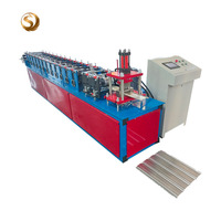 Machine de formage à froid pour lamelles de porte enroulable en aluminium 120-165