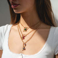 Collier multi-éléments européen et américain avec incrustation de zircon, pierre de naissance, chaîne à maillons plaquée or, avec verre comme pierre principale