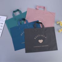 Emballage personnalisé Sac à provisions en plastique sac à provisions en plastique transparent PE personnalisé avec logo pour vêtement