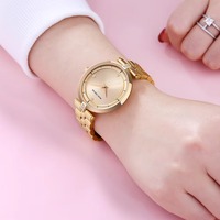 Montre à quartz pour femme avec cadran rond, bracelet en métal, marqueurs décoratifs en cristal, montre-bracelet analogique minimaliste pour un usage quotidien