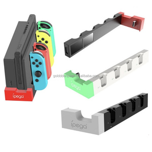 PG-9186 pour Nintendo pour Switch OLED Support de charge <span class=keywords><strong>Dock</strong></span> de chargeur à 4 emplacements pour Joycons Matériau plastique durable - Product Image 1
