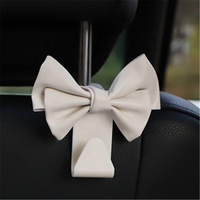Nouveau crochet de rangement pour dossier de siège de voiture Keynew, en cuir PU, avec nœud, support universel pour sacs et sacoches, clips de fixation automobile, capacité de charge 20 kg