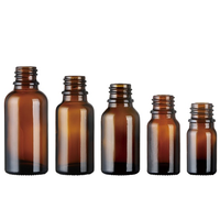 Botol kaca kustom OEM 10ml 20ml 30ml 50ml botol minyak esensial kaca amber botol kaca kosmetik