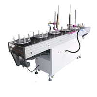 Machine de traitement par flamme pour le traitement des surfaces cylindriques des bouteilles et seaux en plastique PP PE avant la sérigraphie