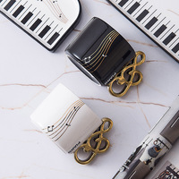 Tasse en céramique en forme de note de musique, vente en gros d'usine, 200 ml, tasse à café créative en forme de clavier de piano, tasse à eau en porcelaine