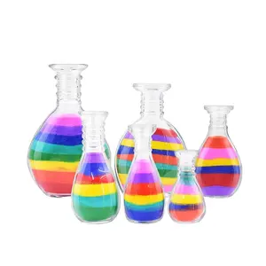 Customize a series of 40 ml to 240 ml clear decorative art sand glass bottle