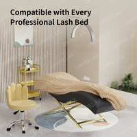 Union Win Nouveau design Table de massage pour salon de beauté Lit à cils incurvé en cuir rose avec base en métal doré Lit de massage pour cils de luxe