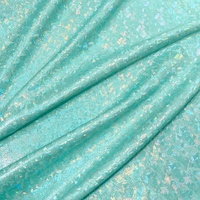 Tissu en nylon et spandex holographique mystique effet verre brisé pour vêtements de danse, maillots de bain et robes – Stock usine
