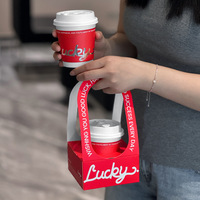 Gobelets à café jetables tendance avec couvercles, emballage commercial à emporter, gobelets en papier imprimés avec estampage à chaud et finition haut de gamme