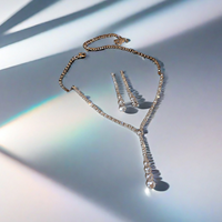 Parure de bijoux de luxe pour femme, élégante et minimaliste, avec strass et diamants, comprenant un collier lariat en Y et des boucles d'oreilles, idéale pour les mariages