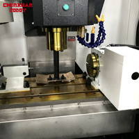 Centre d'usinage CNC vertical contrôlé par PLC, moteur 7,5 kW, garantie 1 an, pour le traitement des matériaux métalliques et de quincaillerie, applications multiples