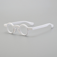 Vente en gros de montures de lunettes rondes de haute qualité, monture de lunettes décorative, fluorescente, myopie unisexe, anti-lumière bleue