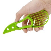 Trancheuse d'avocat 3-en-1 Eplucheuse de fruits Outils de coupe Gadgets de cuisine multifonctionnels en plastique Couteau à avocat Trancheuse