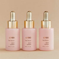 Huile de romarin naturelle personnalisée de marque privée nourrit le traitement de la perte de cheveux du cuir chevelu sérum à la biotine pour la croissance des cheveux