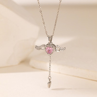 Collier pendentif élégant en acier inoxydable avec zircon, ailes d'ange, ailes volantes, cœur d'amour, pompon, vente en gros