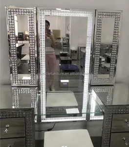 Muebles de dormitorio de cristal brillante, tocador para niñas, diseños de tocador con espejo LED y taburete, mesas de Hollywood