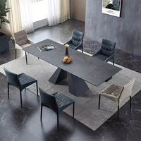 Table à manger extensible en acier inoxydable et marbre, design italien avec plateau en céramique et base en métal