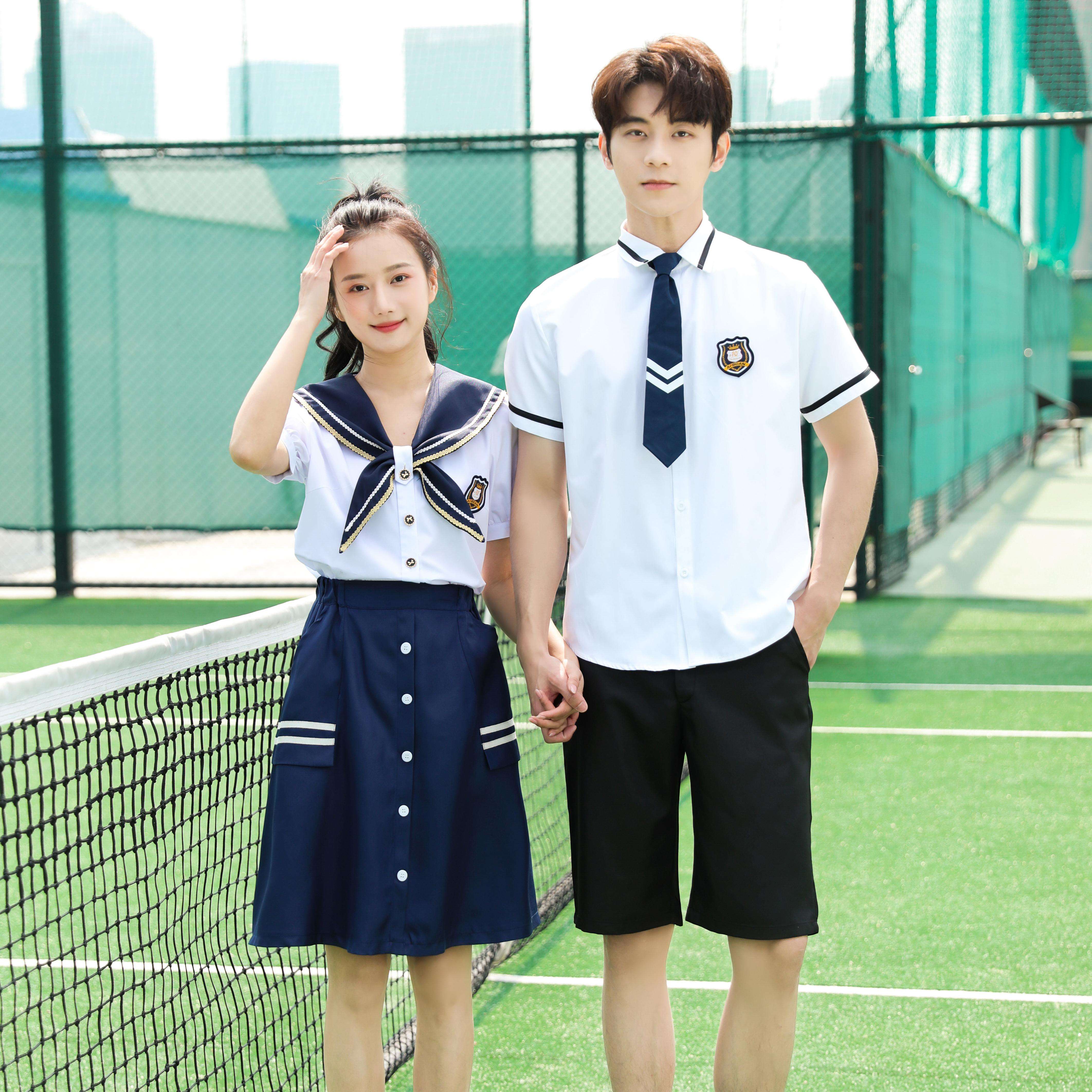 WCostume marin blanc + Jupe boutonnée