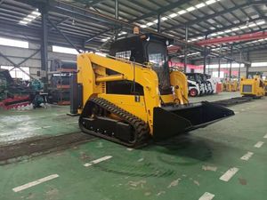 รถตักล้อยางขนาดเล็ก 1200 กก. แบบตีนตะขาบ พร้อมอุปกรณ์เสริม - Product Image 4