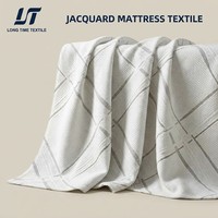 Textile Jacquard Géométrique de Luxe |   Tissu tricoté 350-500GSM |   Toucher doux et durable, qualité hôtelière |   Échantillonnage mondial prêt pour l'ODM