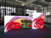 Système de mur vidéo LED clé en main P2.6, pack de transport, écran de location incurvé pour stand d'exposition, écran de fond de scène, centre commercial