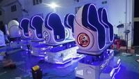 Jeux d'intérieur/extérieurs de réalité virtuelle de cinéma en métal et plastique 9D cinéma 2 de chaise d'oeufs de réalité virtuelle sièges 360 tours de parc de VR