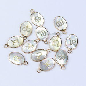 Colgante de concha de doce constelaciones del zodiaco natural, lado único ovalado plano, 13x17mm, con hallazgos de aleación dorada - Product Image 5