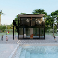 Maisons conteneurs multi-étages abordables avec passerelle et mur-rideau en verre pour un espace de vie moderne et écologique