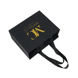 Gros luxe noir chaussures vêtements emballage sacs en papier imprimé logo personnalisé vêtements shopping cadeau bijoux emballage sac en papier