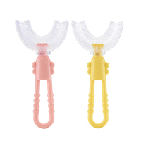 Bébé brosse à dents en forme de u 360 brosse en silicone souple avec emballage en boîte pp