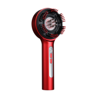 Peigne de massage vibrant Liquid Guide pour stimuler le cuir chevelu avec des picots massants et une thérapie par lumière LED rouge