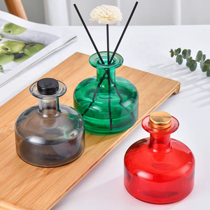 Vente en gros bouteille de <span class=keywords><strong>parfum</strong></span> vide en verre coloré simple rond vert <span class=keywords><strong>rouge</strong></span> gris 150ml - Product Image 1