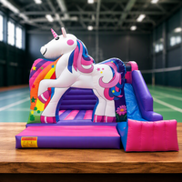 Château gonflable commercial extérieur sur le thème des bonbons rose avec toboggan gonflable pour location de fête pour enfants