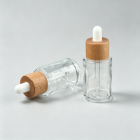 Flacon compte-gouttes en verre givré cylindrique avec bouchon compte-gouttes en bois, logo personnalisé, plusieurs capacités pour l'emballage de sérum de soin de la peau