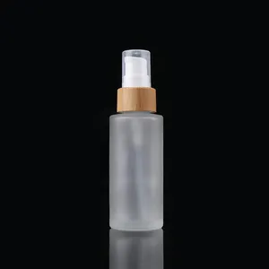 Natural Eco-Friendly 50ml Glass Powder Pump Bottle Matt Frosted Finish 20/410 Bamboo Sprayer Cap Fine Mist Serums Essential Oils