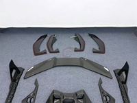 Kit Carrosserie Complet en Fibre de Carbone Sec Style DK de Haute Qualité pour Lamborghini Revuelto : Lame Avant, Jupes Latérales, Diffuseur Arrière, Aileron Arrière et Cache Moteur