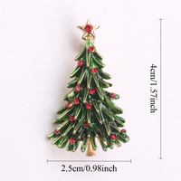 1 broche en forme de sapin de Noël avec émail vert, strass rouges, détails dorés et étoiles, pour décorer les vêtements